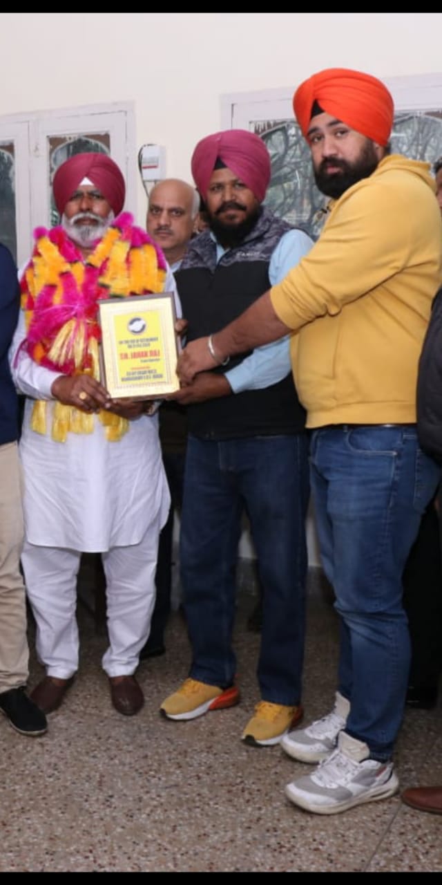 Crane operator Janak Raj honored on retirement after 39 years of service